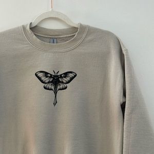 Printed sweatshirt with moth design